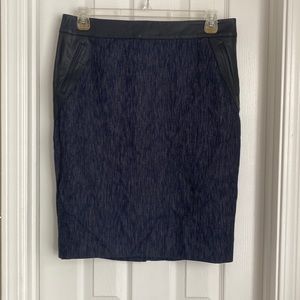 Ann Taylor skirt. Navy/denim color w/ black leather accent. Sz 12. NWT. LINED.